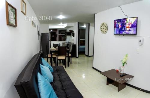 Area tempat duduk di Lindos y cómodos Apartamentos en Guaduales del Café