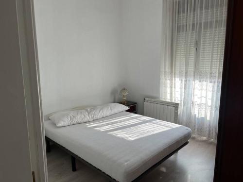 Ένα ή περισσότερα κρεβάτια σε δωμάτιο στο Piso céntrico