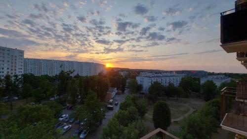 an aerial view of a city at sunset at Apartament SEASIDE Gospody 5a in Gdańsk