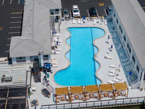an aerial view of a pool on a cruise ship at BeachWalk at Sea Bright in Sea Bright