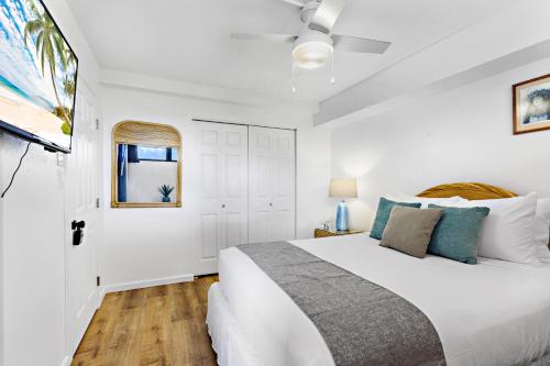 Ένα ή περισσότερα κρεβάτια σε δωμάτιο στο Kahana Villa F407