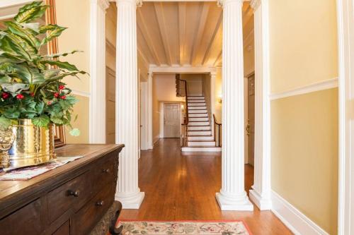 a hallway of a home with white columns at Historic Hagerstown Antietam Battlefield WhiteTail in Hagerstown
