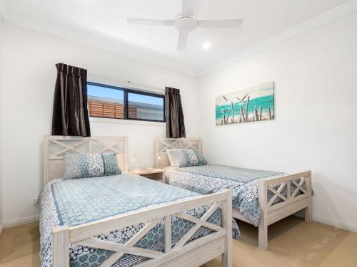 Postel nebo postele na pokoji v ubytování The Doggy Beach House at Pottsville