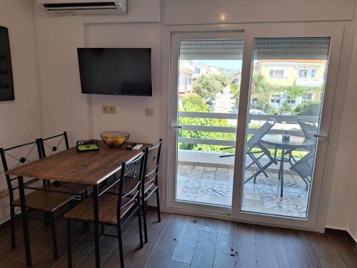Passatempo Apartment Ireonにあるテレビまたはエンターテインメントセンター
