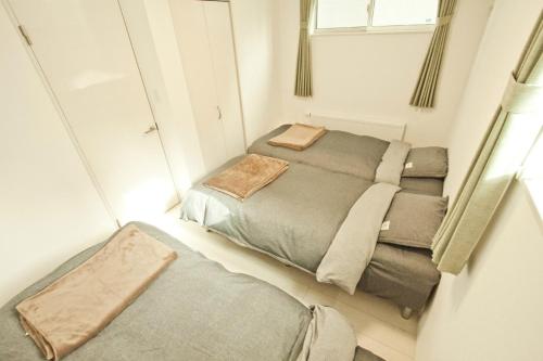 Lova arba lovos apgyvendinimo įstaigoje TakahashiTei / Vacation STAY 2262