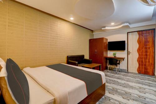 מיטה או מיטות בחדר ב-Hotel Awadh Court