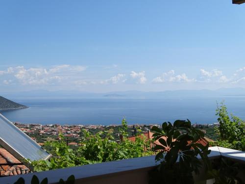 a view of the ocean from a house at MATAS HOUSE in Tiros