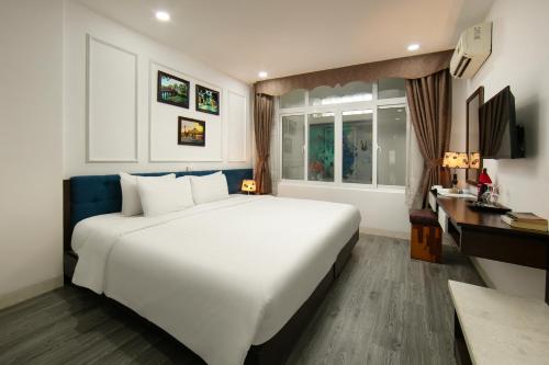 Postel nebo postele na pokoji v ubytování Dream Central Hotel & Spa - Hanoi Old Quarter