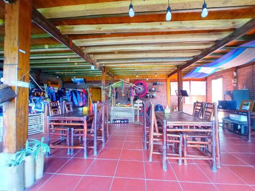 a dining room with wooden tables and chairs at My's Homestay sapa in Sa Pa