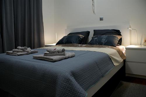 Giường trong phòng chung tại Stylish & relaxing 70 sq. m. flat with balcony