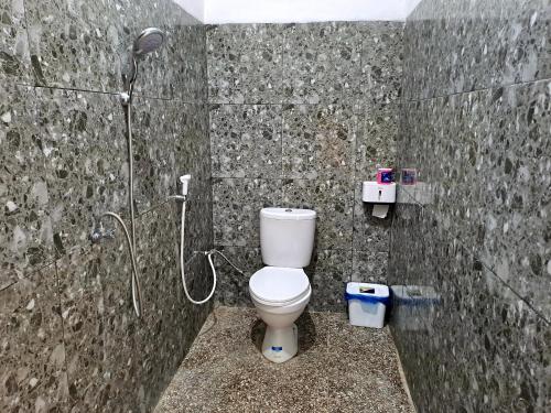 A bathroom at Village Corner Homestay