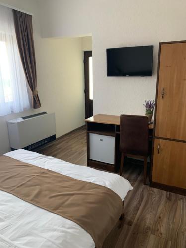 Postel nebo postele na pokoji v ubytování Casa Leda