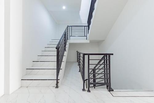 Fotografie z fotogalerie ubytování Urbanview Hotel La De Grizz Syariah Sampit by RedDoorz v destinaci Sampit