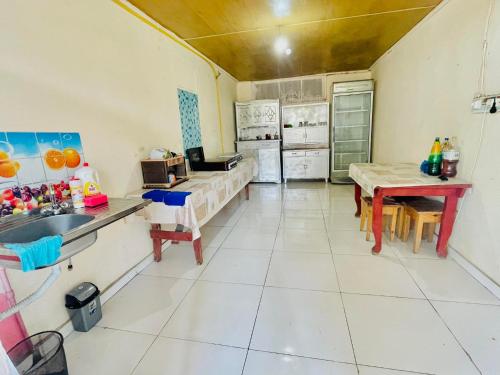 Kuchyň nebo kuchyňský kout v ubytování Guesthouse ''Loni''