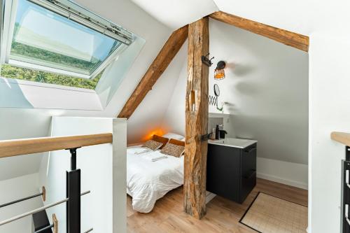 Postel nebo postele na pokoji v ubytování Loft Cosy et atypique