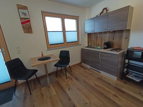 A kitchen or kitchenette at Apart Leo