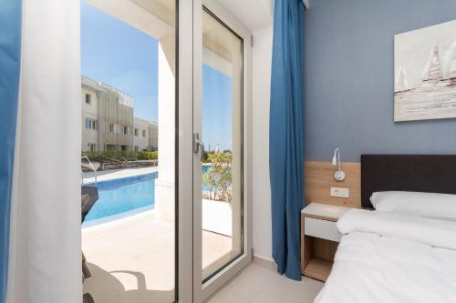 Postel nebo postele na pokoji v ubytování Apartment Julia Umag