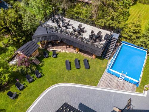 an overhead view of a swimming pool in a yard at Leśny Dwór in Murzasichle