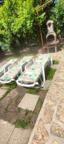 a row of tables laying on the ground at CASA AMBROZIA in Eforie Sud