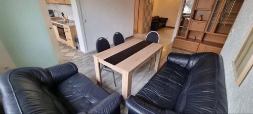 Posezení v ubytování Monteurhaus in Hemer - Gemeinschaftsnutzung Küche und Bad