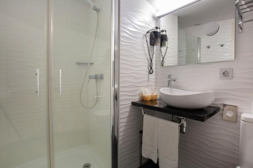 Kylpyhuone majoituspaikassa Hotel Del Pui