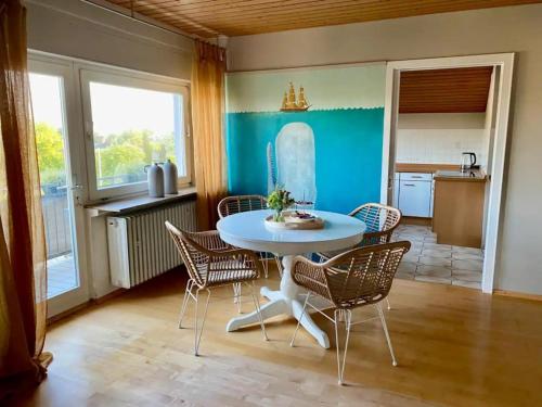a dining room with a table and chairs at bei Servays in Eppingen