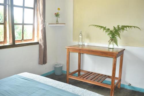 Katil atau katil-katil dalam bilik di Mama's Homestay Ruteng