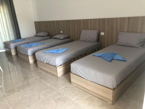Katil atau katil-katil dalam bilik di Sweet Hotel