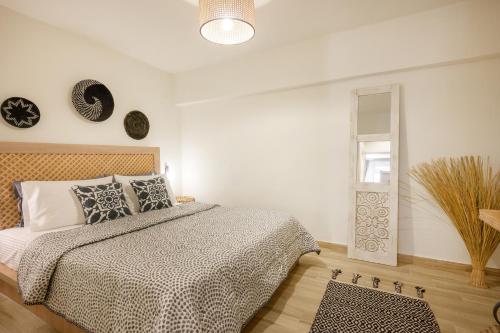 Postel nebo postele na pokoji v ubytování Casa Dimitrios Ammouliani