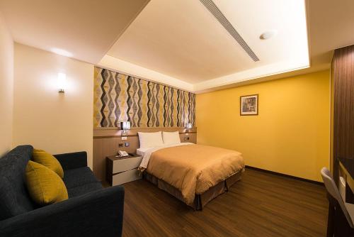 Postel nebo postele na pokoji v ubytování Sir Motel - Sanchong