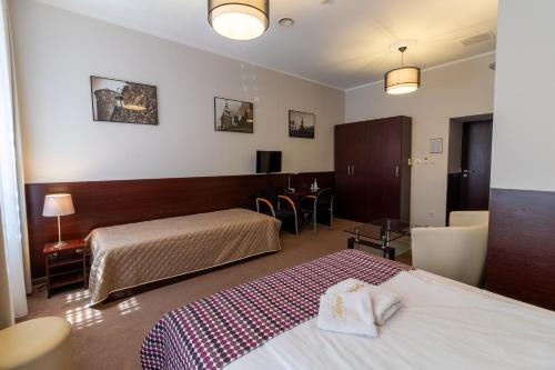 Кровать или кровати в номере Atlantic Aparthotel