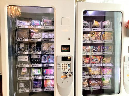 a vending machine filled with lots of food and drinks at J Hotel Rinku in Tokoname