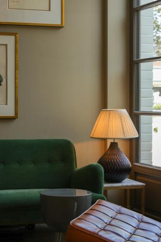 Χώρος καθιστικού στο Mimosa Hotel