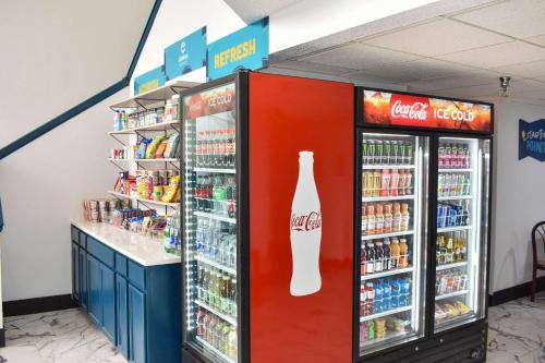 two soda machines in a store with drinks at Clarion Pointe Vidalia - Lyons West in Vidalia