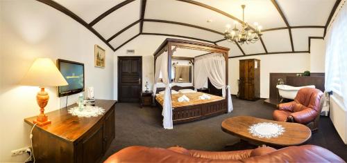Ένα ή περισσότερα κρεβάτια σε δωμάτιο στο Świtezianka