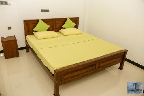Voodi või voodid majutusasutuse Jayananda Estate Villa toas