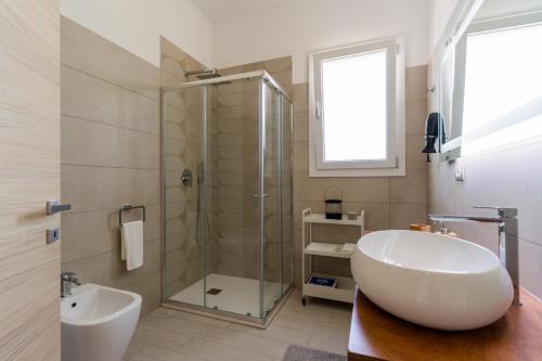 Ένα μπάνιο στο Le scuderie 11