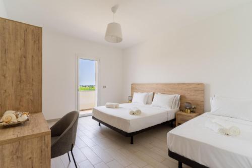 Ένα ή περισσότερα κρεβάτια σε δωμάτιο στο Le scuderie 11