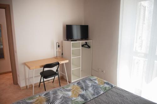 TV a/nebo společenská místnost v ubytování La Casetta di Giorgio