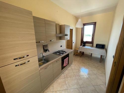 Kuchyň nebo kuchyňský kout v ubytování Casa Leonardo
