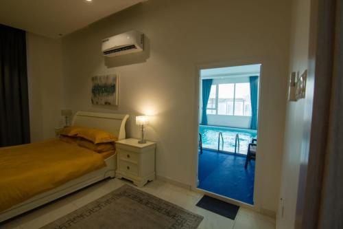 Voodi või voodid majutusasutuse The One chalet Oman toas