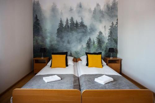 Een bed of bedden in een kamer bij Gościniec Wierchowy