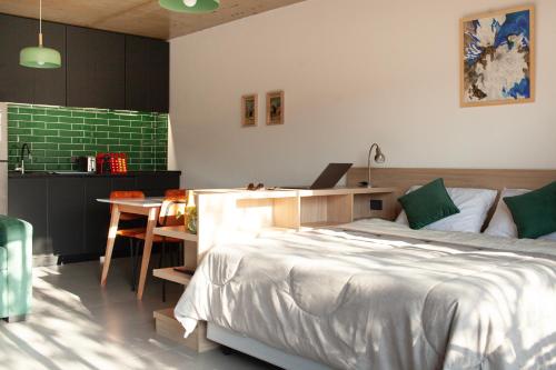 Postel nebo postele na pokoji v ubytování Primavera Suites