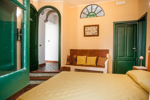 Postel nebo postele na pokoji v ubytování B&B Casa Andrea