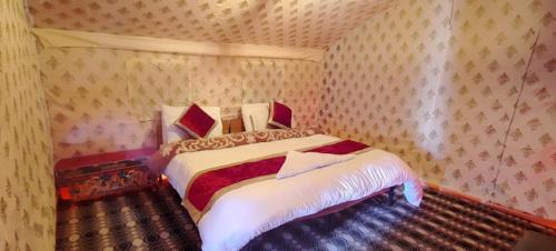 a bedroom with a large bed in a room at P3 Camp Pangong in Spangmik