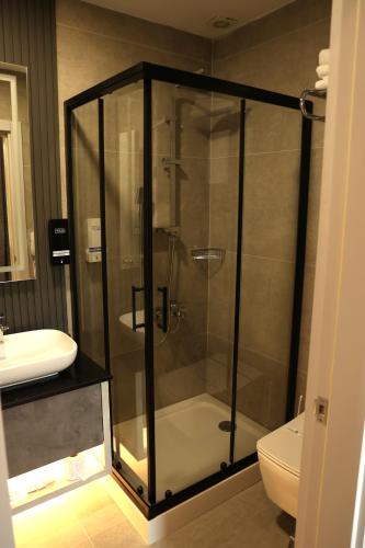 Koupelna v ubytování Hotel Lazlakar