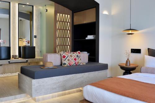 Aktaion Beach Boutique Hotel & Spaにあるベッド