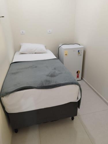 Katil atau katil-katil dalam bilik di Residencial Terrazas
