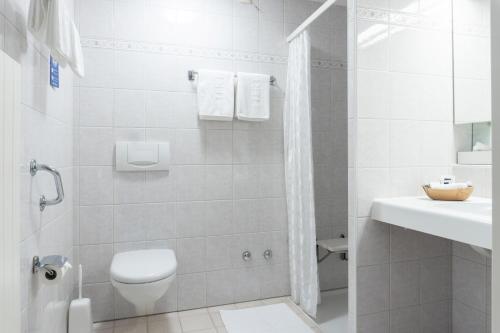 Koupelna v ubytování Tertianum Residenza Al Parco Appartements & Restaurant