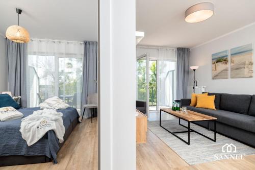 Postel nebo postele na pokoji v ubytování Apartament River Side-basen,jacuzzi,sauna,siłownia-Marina Dziwnów-SANNEL Apartments for rent